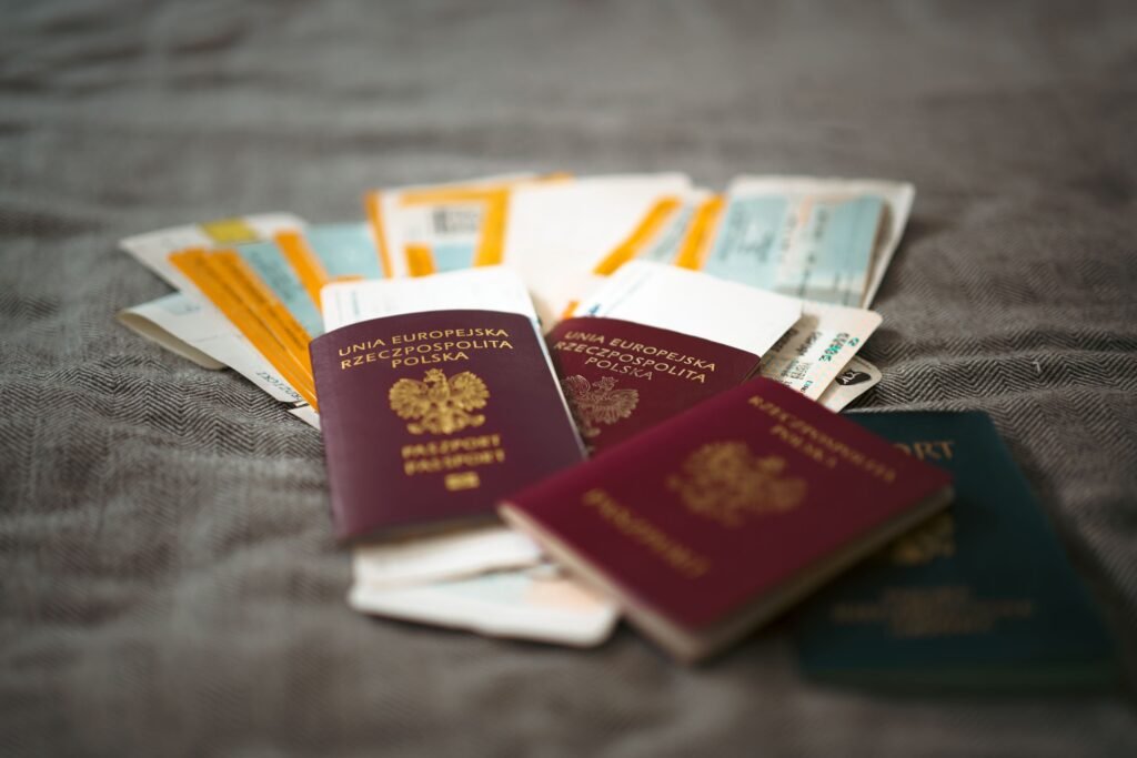 pexels-photo-33497885-33497885 Close-up of Polish passports and travel tickets symbolizing travel and adventure.